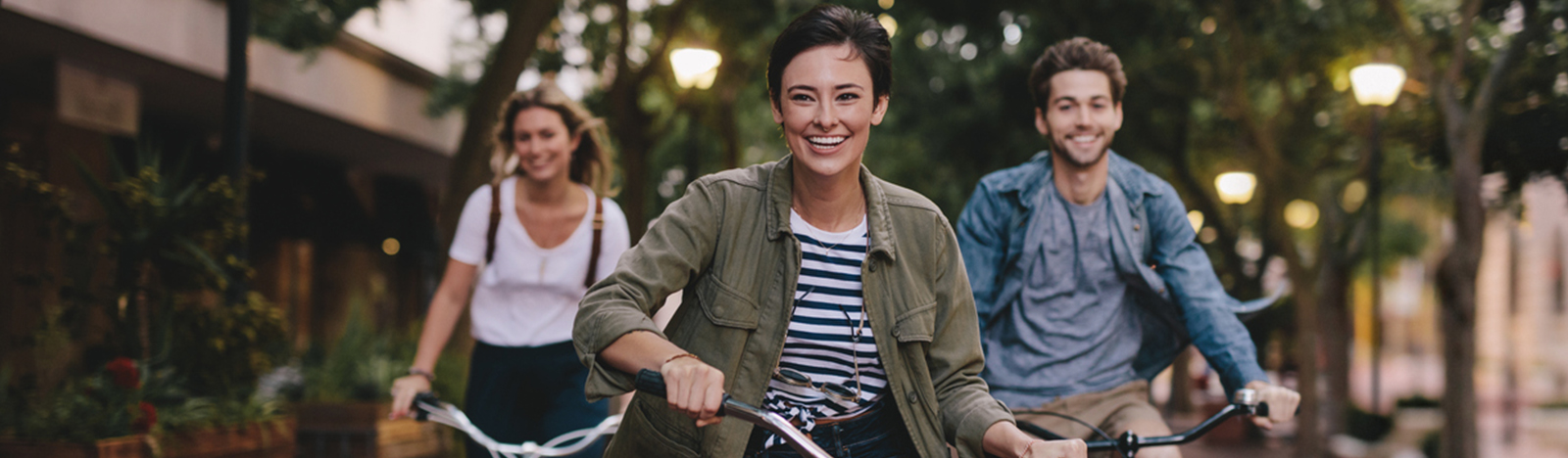 Group of young adults riding bikes