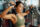 Young woman using fitness equipment