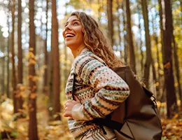 young woman hiking in the woods
